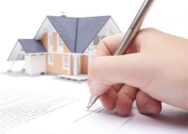 signing a house related document